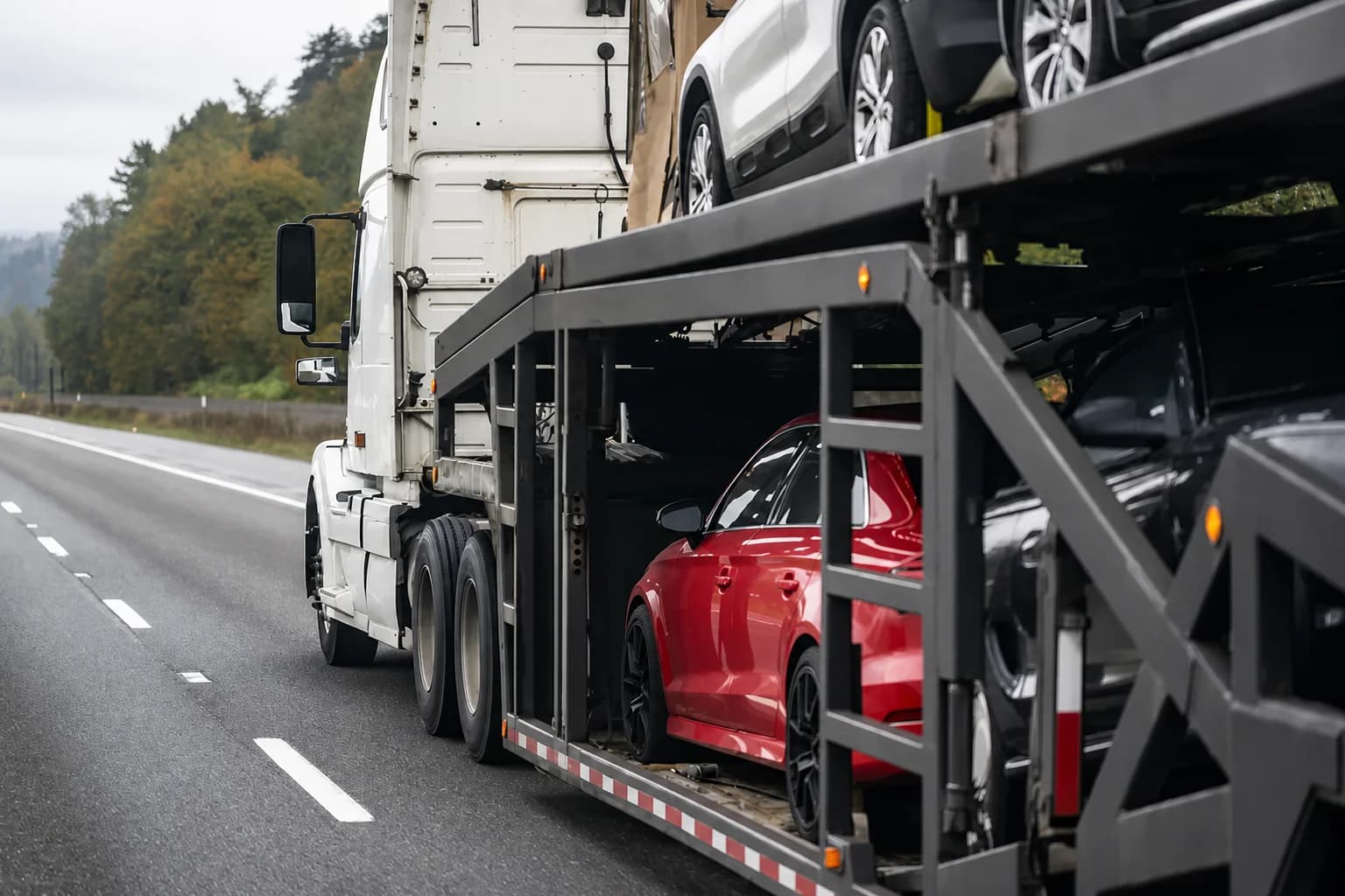 Car carrier truck transporting vehicles on the highway